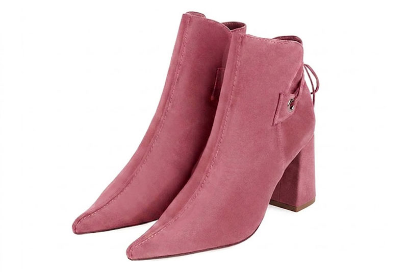 Dress ankle boots back laces in carnation pink leather with high slim heels and pointed toe - Front view